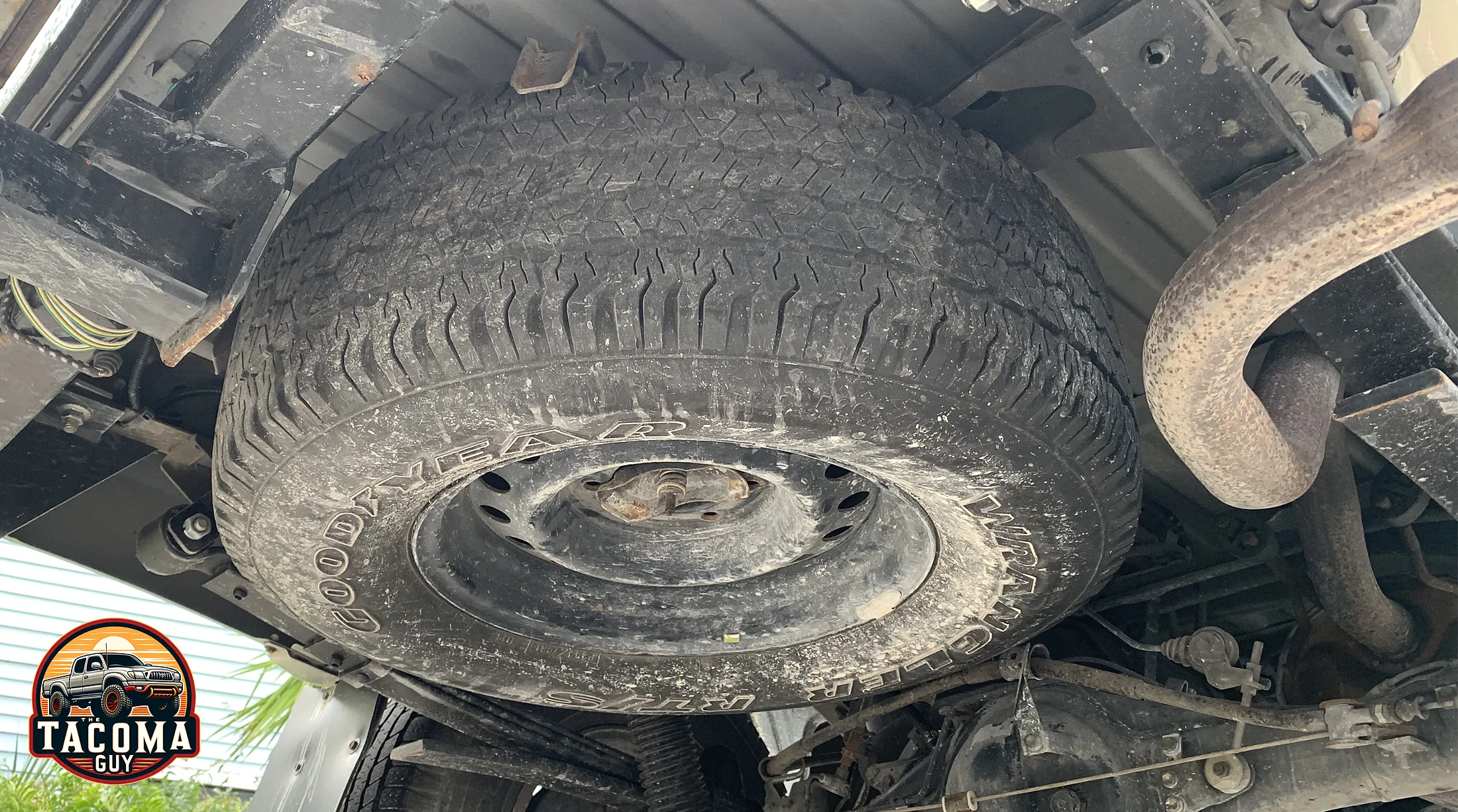 Spare tire underneath a Toyota Tacoma