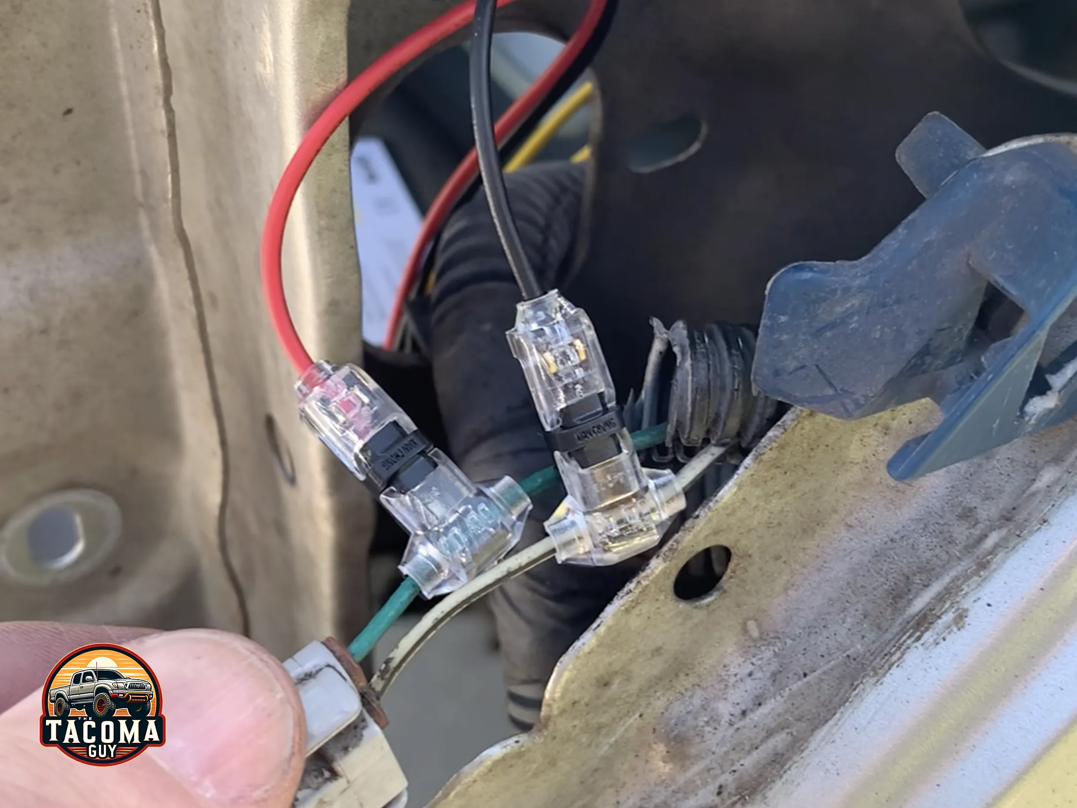 Wire taps on the side light power and ground cables on a gen 1 toyota tacoma