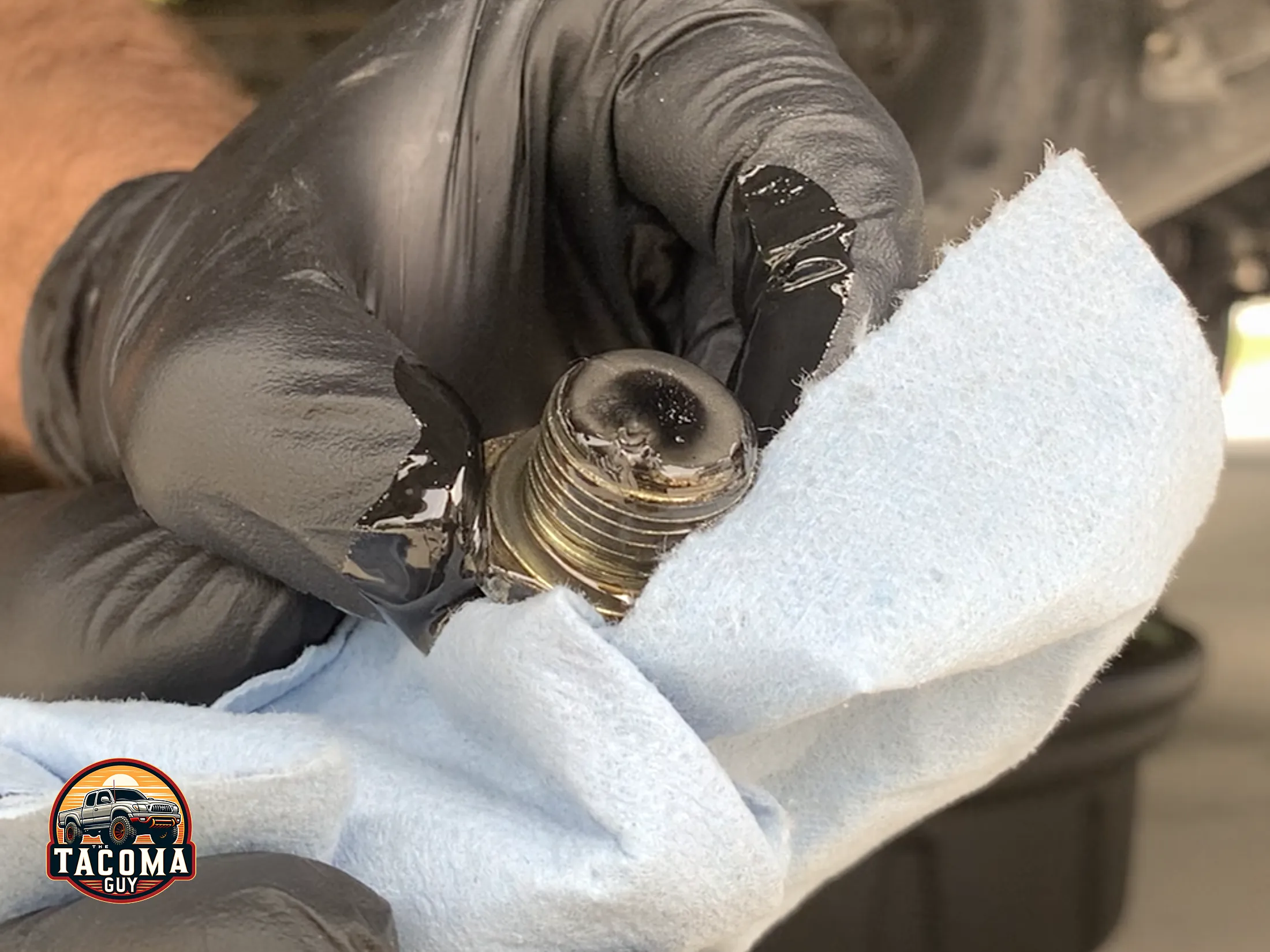 Small metal shavings on the magnet attached to the drain plug of the rear differential of a 2004 toyota tacoma