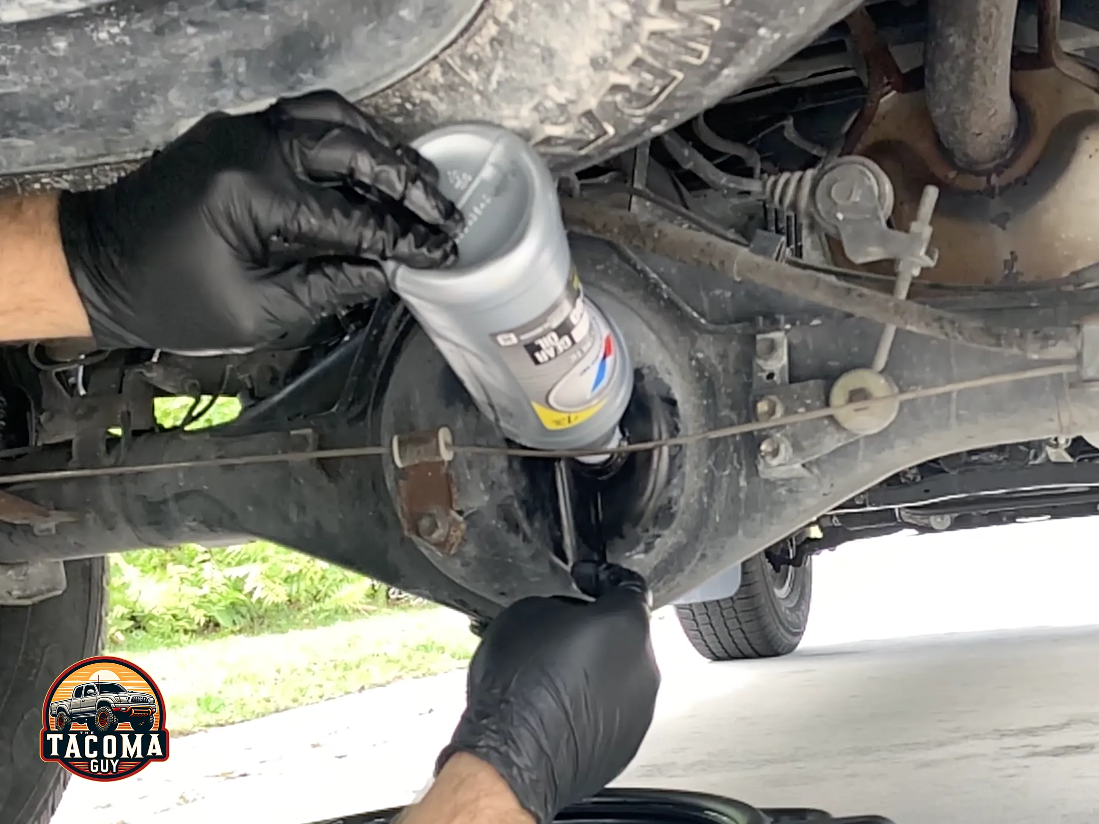 Filling the rear differential with 3 quarts of gear oil into a 2003 toyota tacoma