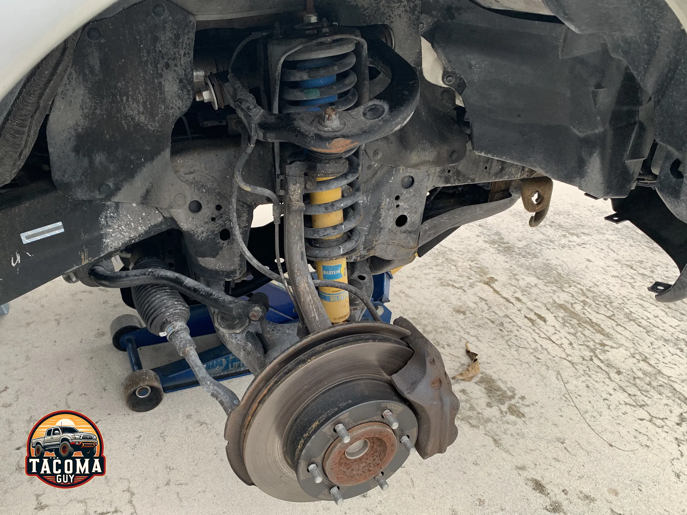 OEM Bilstein shock absorber and strut assembly on a gen 1 toyota tacoma